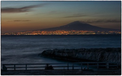 Cycling Sicilia - bivvy on the shore with the view on smoking Etna - photo Tomasz rdvnature.com
