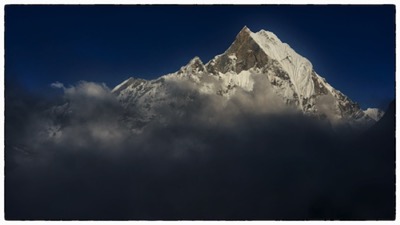 Machapuchare in the clouds, Nepal - photo Tomasz http://rdvnature.com