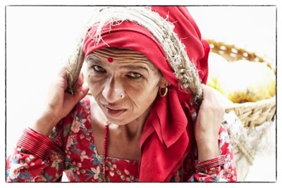 Dame selling papayas in Pokhara, Nepal - photo Tomasz http://rdvnature.com